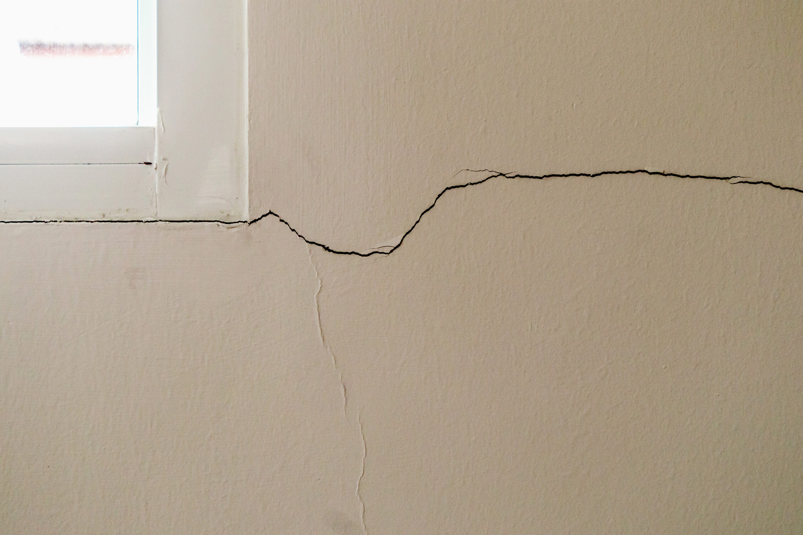 Wall crack near window